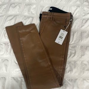 The stiletto high rise skinny ankle jeans.